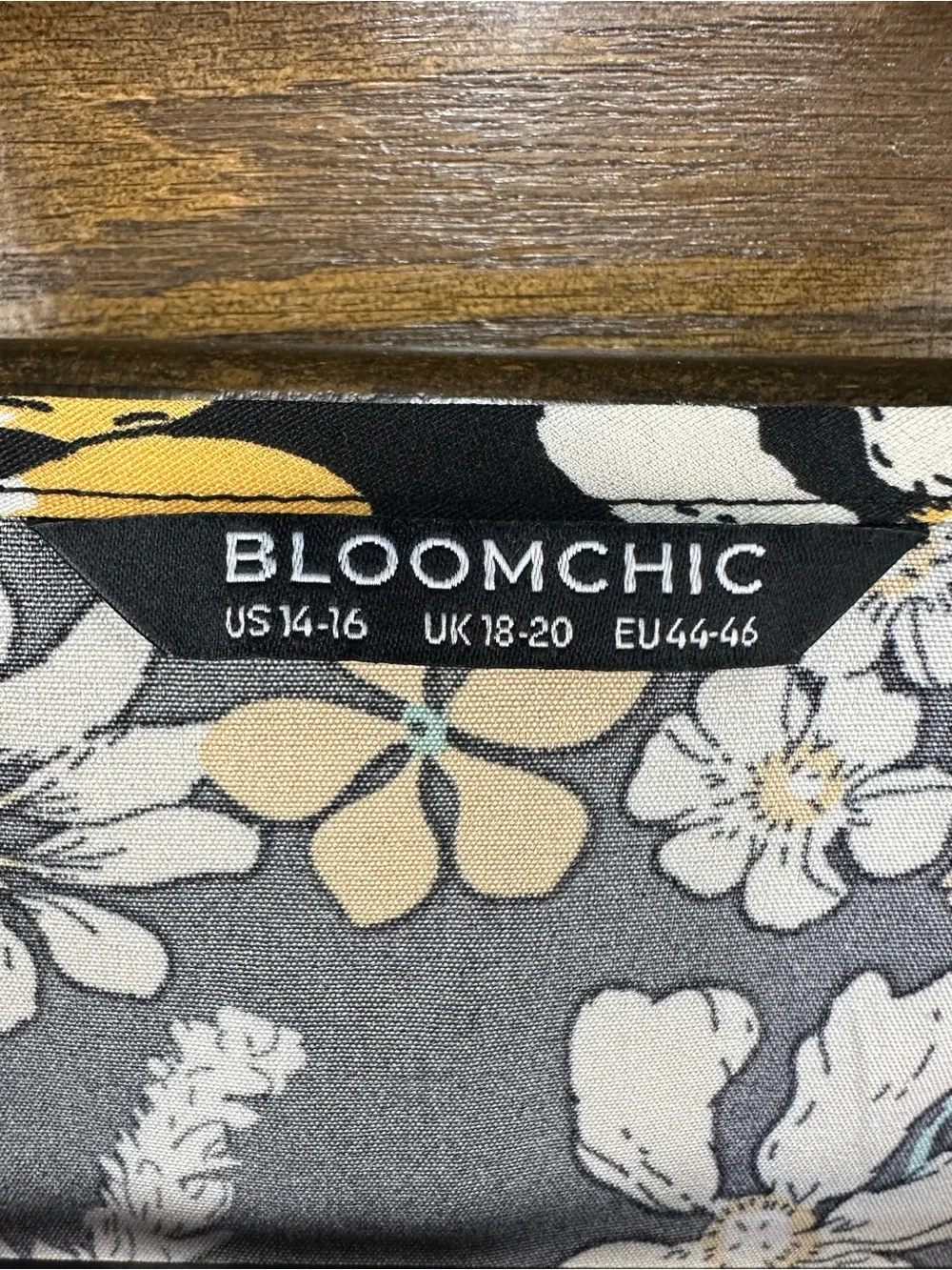BloomChic Black Floral V-Neck Blouse with Yellow & White Flowers
